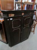 An old corner cupboard in need of a little tlc