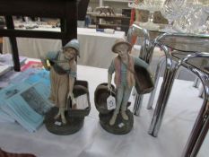A pair of German bisque porcelain figures,