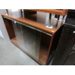 A glazed sliding door cabinet