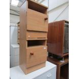 A pair of bedside cabinets