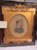 A Victorian portrait in gilded frame under glass (glass case a/f)