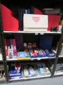 3 shelves of stationery items