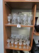 A quantity of glasses (2 shelves)