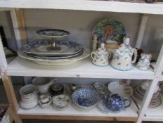 2 shelves of vintage china including meat platters, lustre ware, figural tea ware etc.