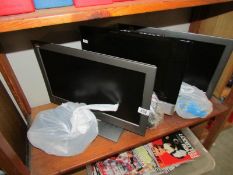 3 flat screen televisions with leads and controls