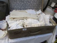 An assortment of vintage linens,