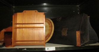 A shelf of wooden items including small corner cupboard