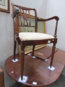 A mahogany elbow chair