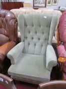 A wing back arm chair