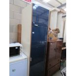 A tall kitchen cabinet