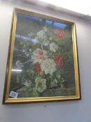 A framed and glazed floral print