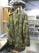 A camouflage jacket and trousers