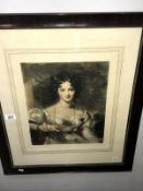 A framed and glazed portrait print of a lady