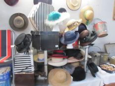 An assortment of 24 plus hats,