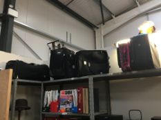 A holdall and 5 suitcases