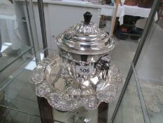 A silver plate tray and lidded sugar bowl