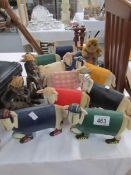 A quantity of wooden animals and figures