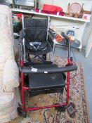 A wheel chair and a walking aid