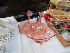 A pink glass trinket set and posy bowl