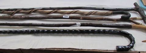 5 old walking sticks