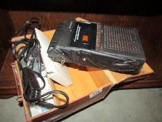 A Hitachi tape recorder with accessories