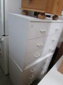 A pair of 3 drawer white chests