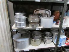 2 shelves of pots and pans