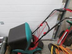 A Bosch lawn mower and a Qualcast strimmer