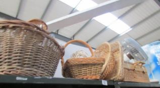 A picnic basket and other basket ware