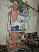 A quantity of garden pots etc (6 shelves)