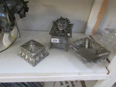 2 metal boxes and a dish
