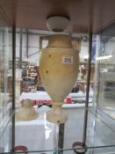 An old alabaster urn with lid