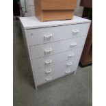 A white 5 drawer chest