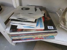 A quantity of 45 rpm and LP records