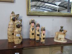 A quantity of wooden figures including animals