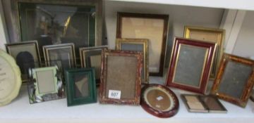 A shelf of photo frames