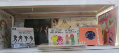 A box of assorted records