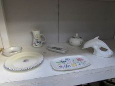 7 items of Poole pottery