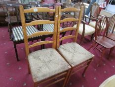 A pair of ladder back chairs