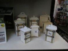 8 continental art deco storage jars,