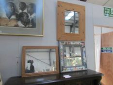 A pine framed mirror and 2 others