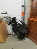 A golf bag and clubs