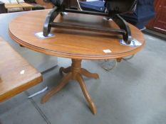 A teak dining table