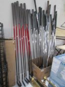 A large quantity of golf clubs