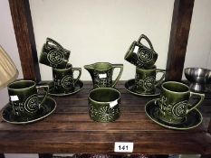 A 12 piece Portmeirion pottery 'totem' coffee set by Susan Williams Ellis'