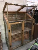 A greenhouse potting cabinet