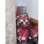 5 bolts of fabric and a quantity of cushions