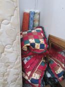 5 bolts of fabric and a quantity of cushions