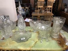 A quantity of moulded glass vases/decanters