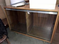 A glass fronted cabinet